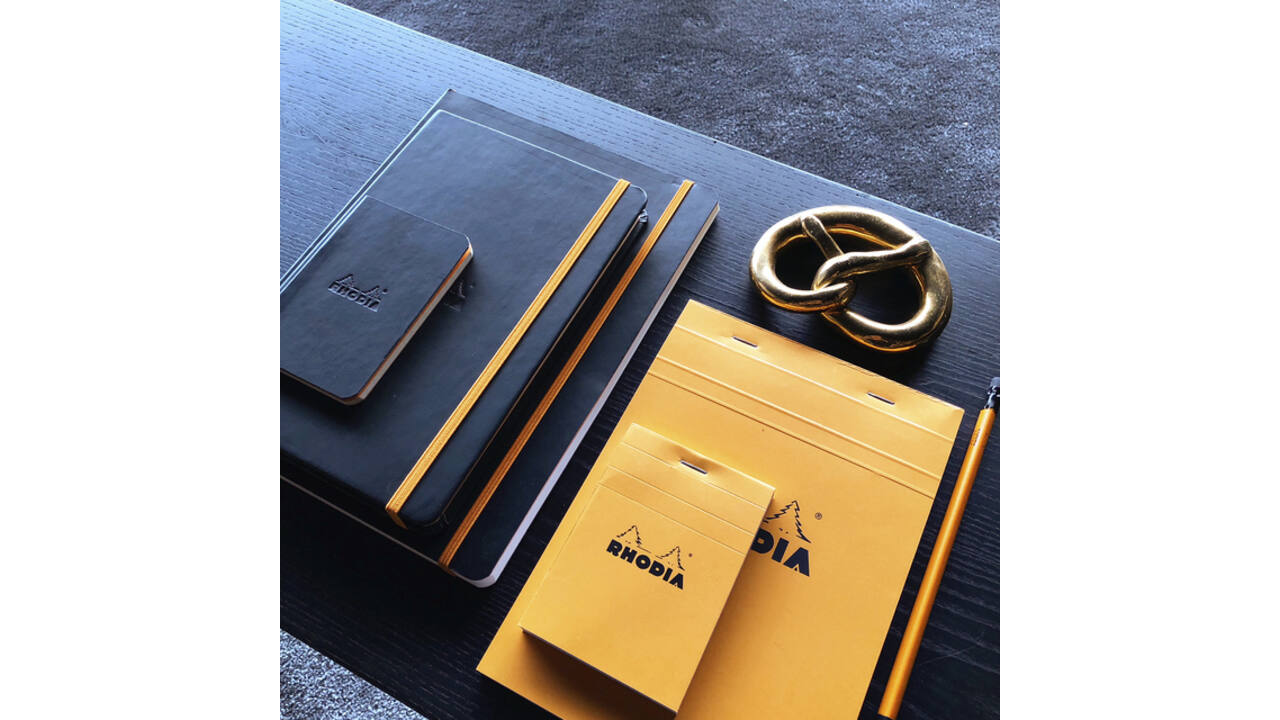 Schrijfblok Rhodia A4 lijn 80 vel 80gr oranje