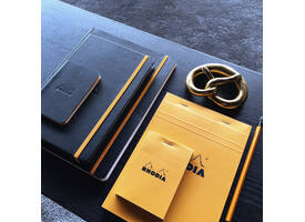 Schrijfblok Rhodia A5 lijn 80 vel 80gr met kantlijn oranje